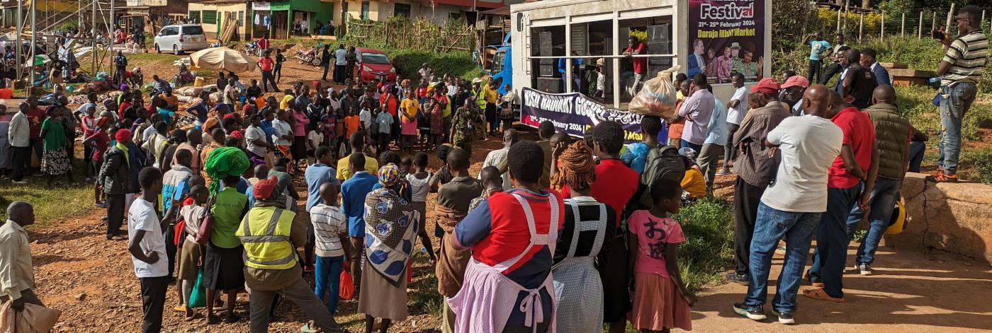 Mobile stage in Homa Bay market with live music and gospel preaching